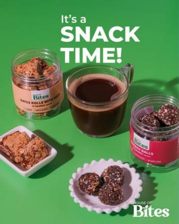 Dates rolls with oats and energy balls beside a glass of coffee.